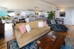 The living room opens to the dining area and kitchen